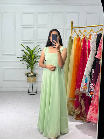Embroidered Faux Georgette Gown with Net Dupatta and Koti