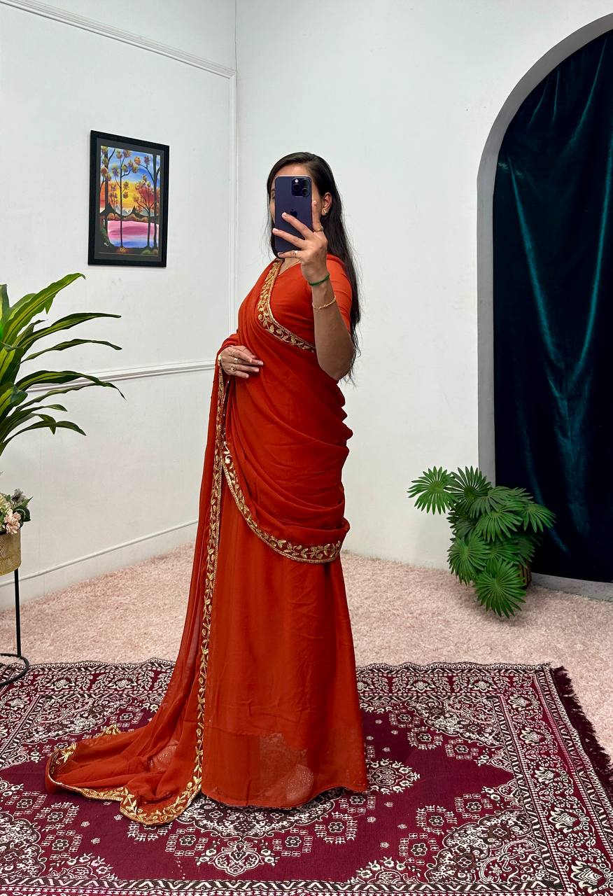 Elegant Faux Georgette Gown with Embroidered Lace Dupatta & Pleated Flair (Orange)