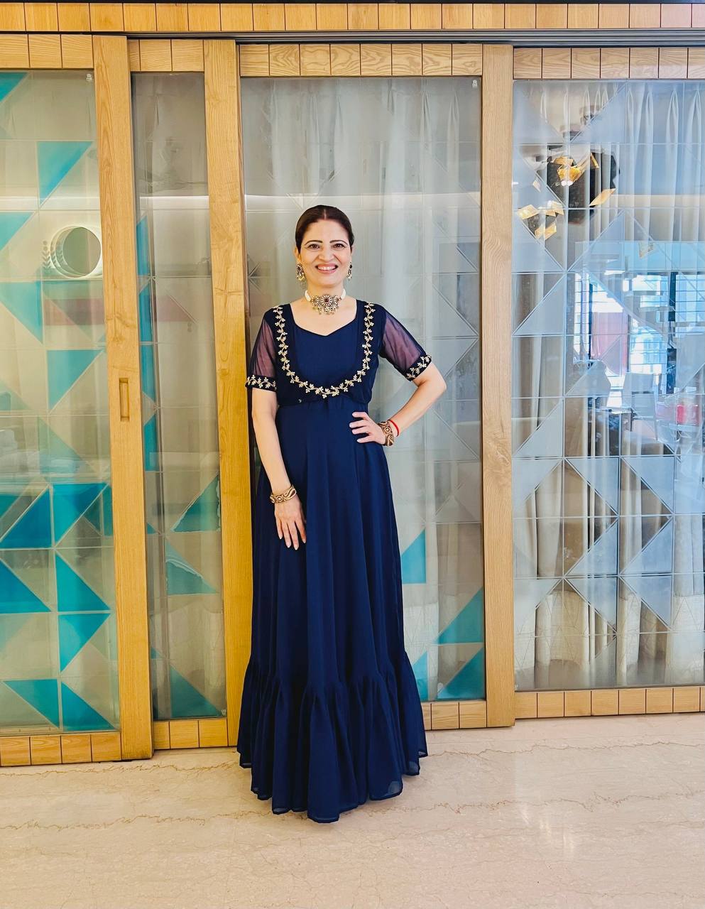 Embroidered Faux Georgette Gown with Ruffle Flair & Matching Koti (Blue)